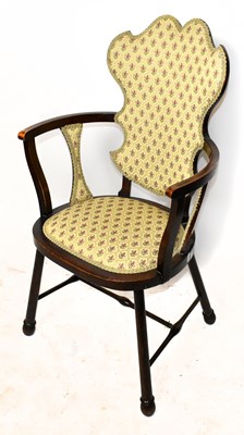 Lot 1674 - An Edwardian open arm elbow chair