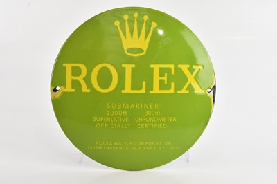 Lot 1215 - A reproduction Rolex enamelled circular sign,...