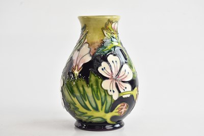 Lot 1462 - MOORCROFT; a 'Mallow' pattern vase, height...