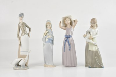Lot 1438 - LLADRÓ; a collection of three figures...