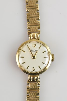 Lot 1051 - RECORD; a lady's 9ct gold cased wristwatch,...