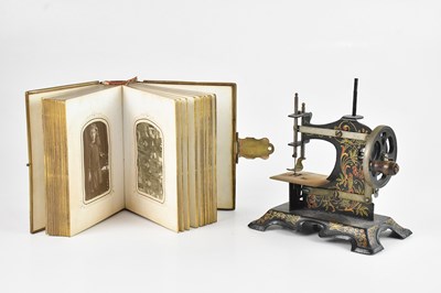 Lot 1213 - A Muller toy sewing machine and a late...