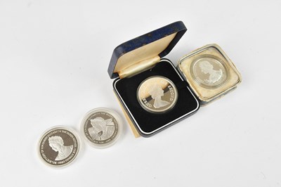 Lot 677 - A group of three silver proof Queen Mother...