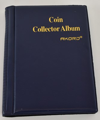 Lot 1595 - An album containing a collection of...