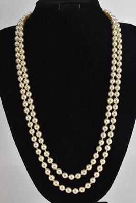 Lot 1394 - A single strand cultured pearl necklace, with...