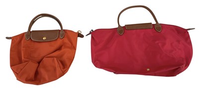 Lot 466 - LONGCHAMP; two lady's brown leather mounted...