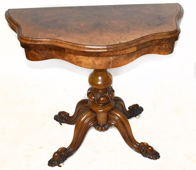 Lot 1579 - A Victorian walnut serpentine card table