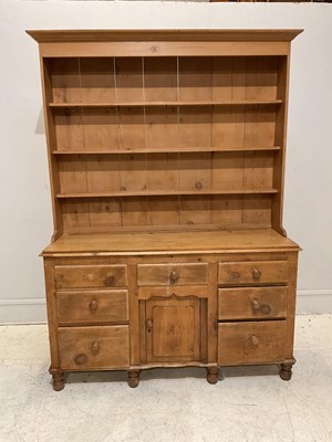 Lot 1078 - An old pine dresser with boarded plate rack...