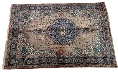 Lot 1209 - A blue ground hand knotted wool Iznik type...