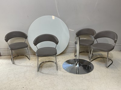 Lot 1206 - A modern circular glass top table with chrome...
