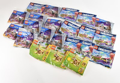 Lot 635 - LEGO; twenty-two individual packets of Lego...
