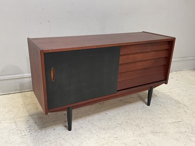 Lot 1052 - A mid century sideboard with five drawers and...