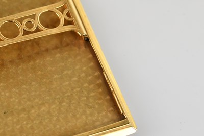 Lot 1 - CARTIER; an exquisite 18ct yellow gold...