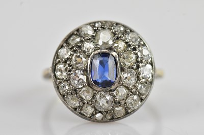 Lot 460 - A yellow and white metal diamond and sapphire...