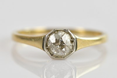 Lot 551 - A Victorian yellow metal diamond solitaire...