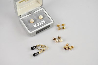 Lot 245 - A pair of yellow metal diamond and red stone...