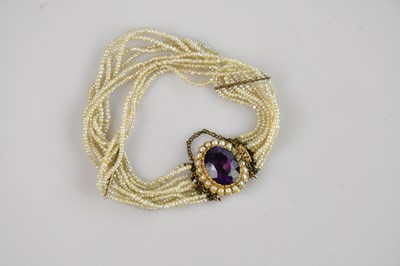 Lot 91 - A Victorian seed pearl and amethyst set...