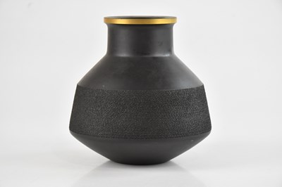 Lot 52 - ROBERT MINIKIN FOR WEDGWOOD; a black basalt...