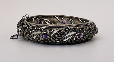 Lot 501 - An unmarked silver amethyst and marcasite set...