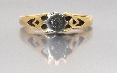 Lot 503 - A 9ct yellow gold tiny diamond set solitaire...