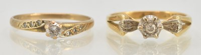 Lot 1225 - Two 9ct yellow gold diamond set rings, the...