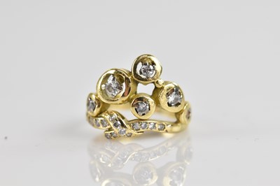 Lot 495 - A yellow metal diamond set rubover twenty...