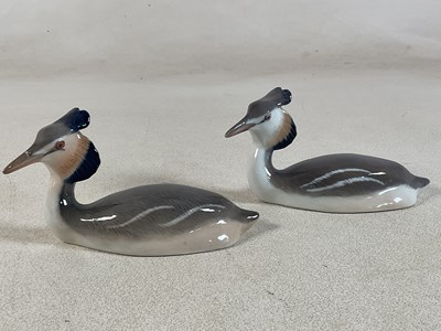 Lot 267 - ROYAL COPENHAGEN; a pair of porcelain models...