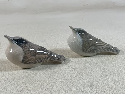 Lot 237 - ROYAL COPENHAGEN; a pair of porcelain models...