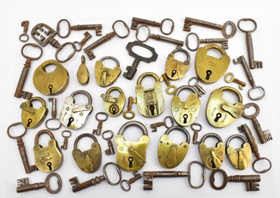 Lot 333 - Fifteen various vintage brass padlocks and one...