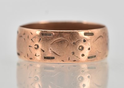 Lot 1266 - A 9ct rose gold band ring, size R, approx 3.07g.