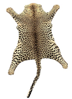 Lot 424 - An early 20th century taxidermy leopard skin...