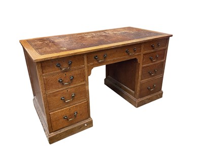 Lot 1070 - WARING & GILLOW LANCASTER; an Edwardian oak...