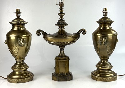 Lot 1312 - A modern pair of brass urn shaped table lamps...
