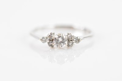 Lot 639 - A white metal diamond ring, marked 18k, set...