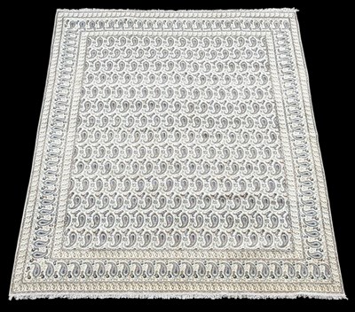 Lot 85 - A Persian cream ground hand woven wool pile...