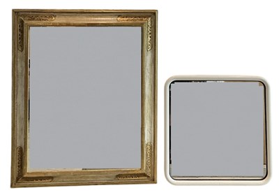 Lot 77 - A modern bevelled glass wall mirror, with...