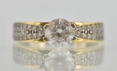 Lot 1299 - A 9ct yellow gold dress ring, with claw set...