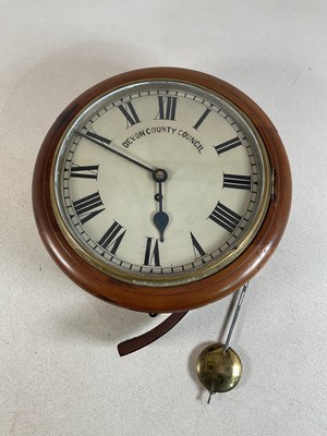 Lot 142 - A mahogany circular single fusée wall clock,...