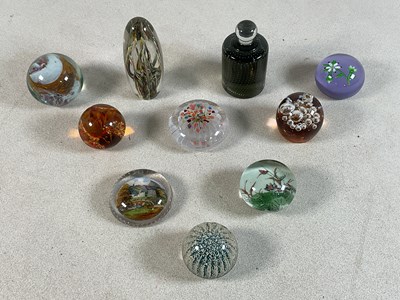 Lot 180 - A group of paperweights, including Czech,...