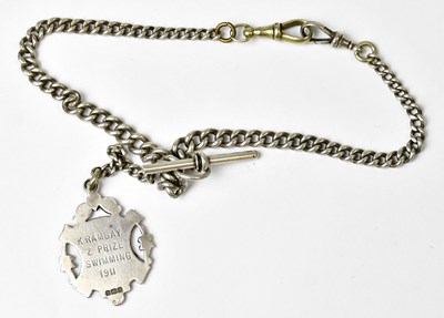 Lot 884 - A hallmarked silver curb link watch chain set...