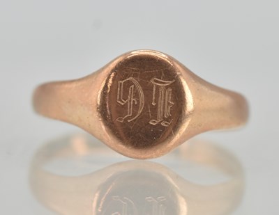 Lot 1301 - A 9ct rose gold signet ring, with rubbed...