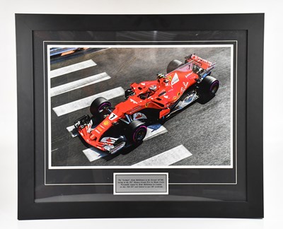 Lot 391 - F1 INTEREST; an autographed photograph of Kimi...