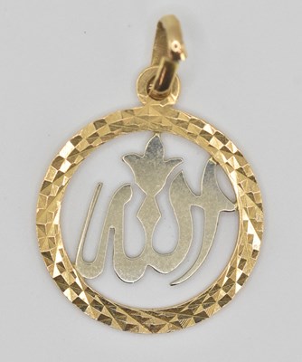Lot 1364 - A Middle Eastern 18ct gold pendant, with a...