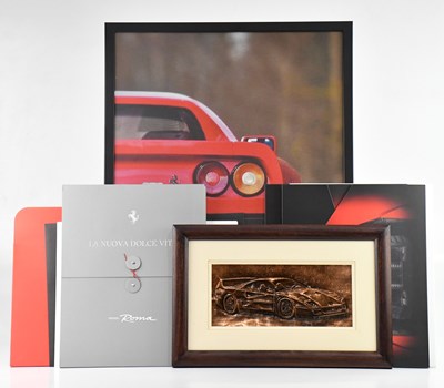 Lot 425 - FERRARI INTEREST; a framed steel picture of...