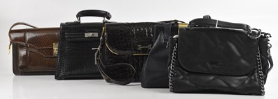 Lot 1534 - GUESS; a black quilted leather handbag with...