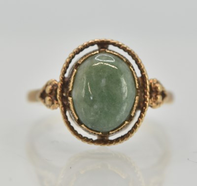 Lot 1328 - A 9ct yellow gold dress ring, with bezel set...