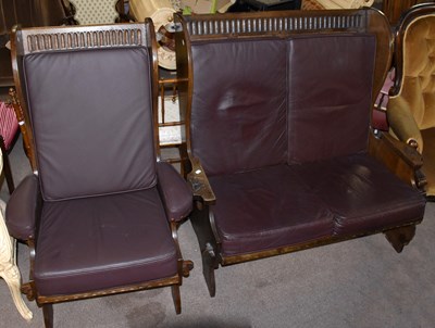 Lot 1566 - NIGEL GRIFFITHS; a carved oak settle and corresponding chair