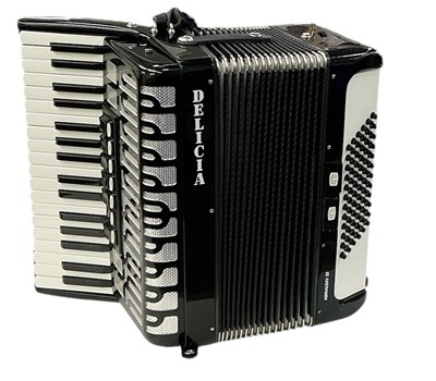 Lot 382 - DELICIA; a cased vintage black and white...