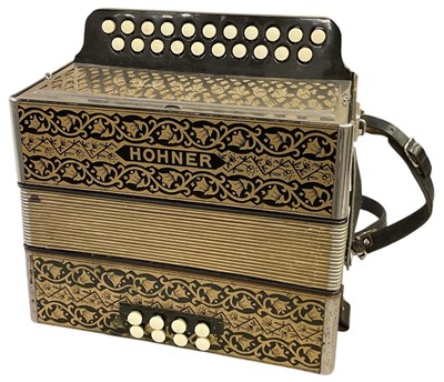 Lot 383 - HOHNER; a vintage German pokerwork melodeon,...