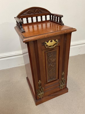 Lot 1121 - A Victorian carved walnut coal purdonium, with...